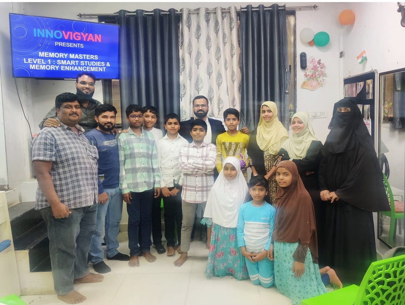 Happy student receiving a prize from InnoVigyan mentor