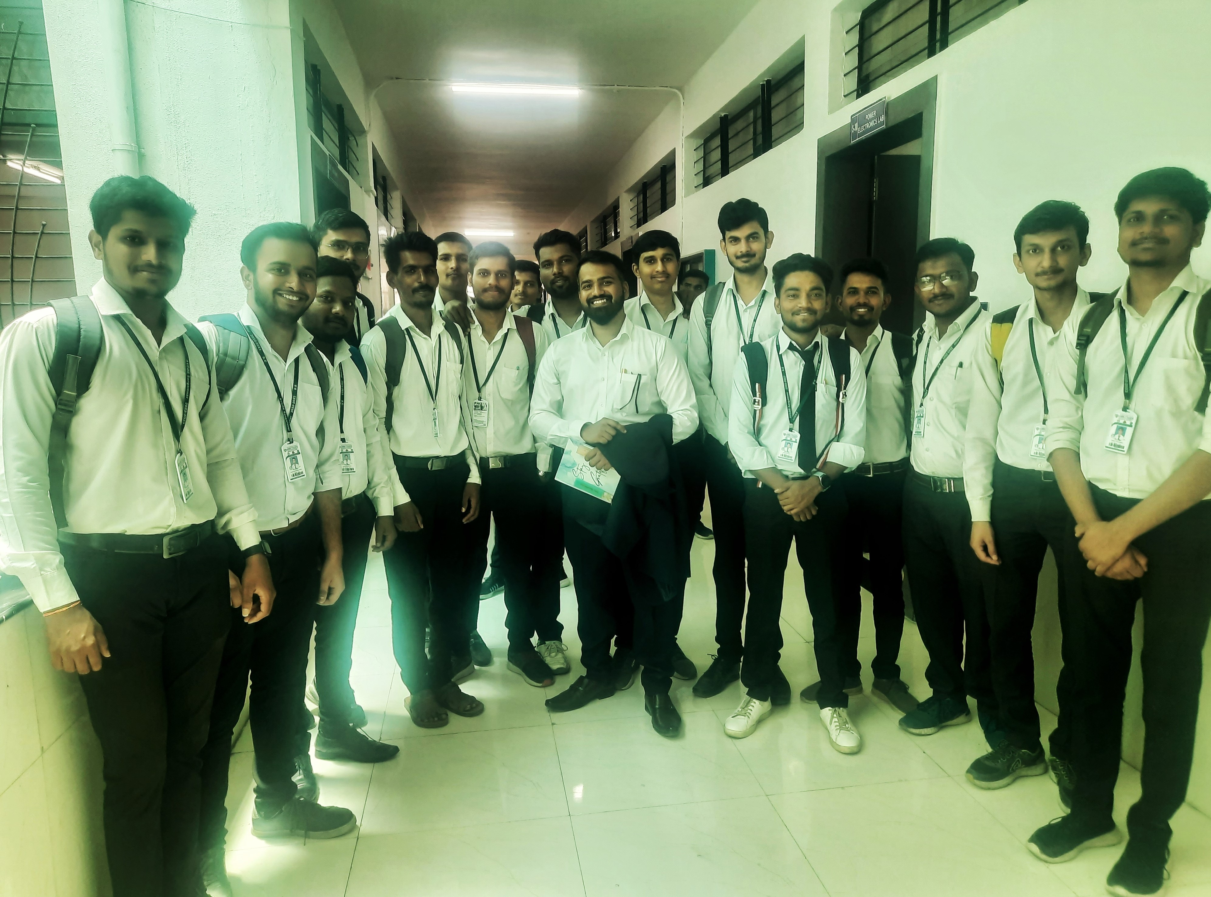 Happy student receiving a prize from InnoVigyan mentor